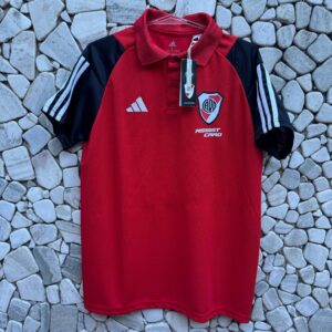 Chomba roja mangas negras temporada 2023/24