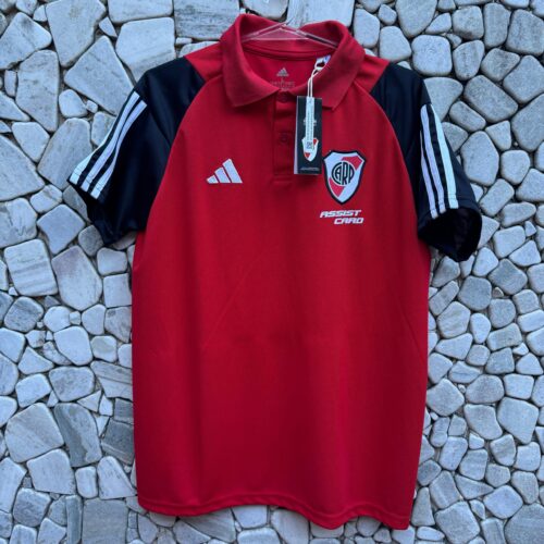 Chomba roja mangas negras temporada 2023/24